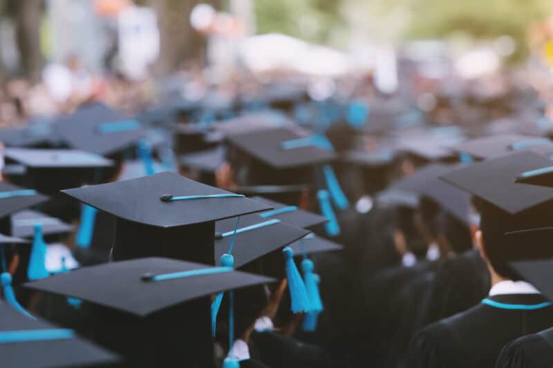 backside graduation hats during commencement success graduates o